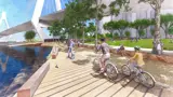 Artist's impression of families riding bikes and relaxing at Bank Street Park under the Anzac Harbour Bridge